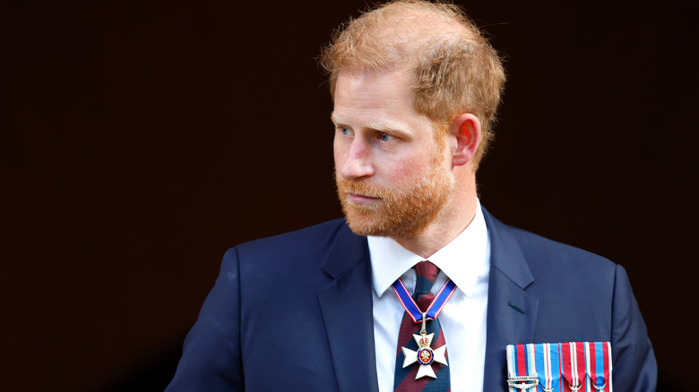 Prince Harry looking morbid