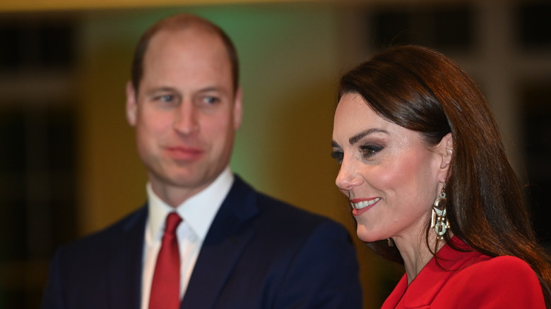 William looking lovingly at Kate