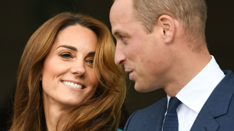 2019 The Duke and Duchess of Cambridge talk closely, Kate Middleton smiles at William