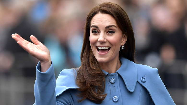 Kate Middleton smiling and waving