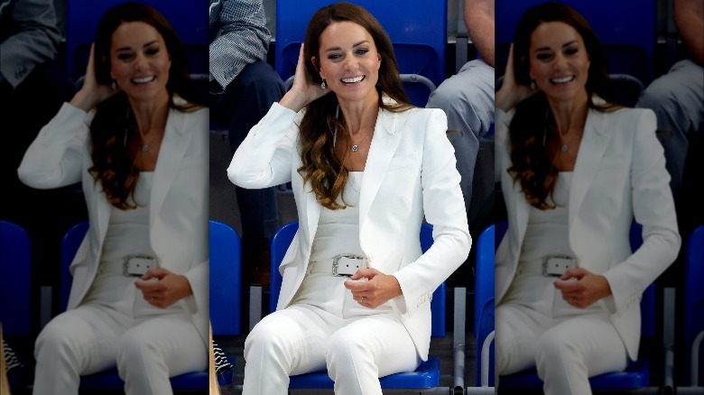 Kate Middleton sitting in a chair