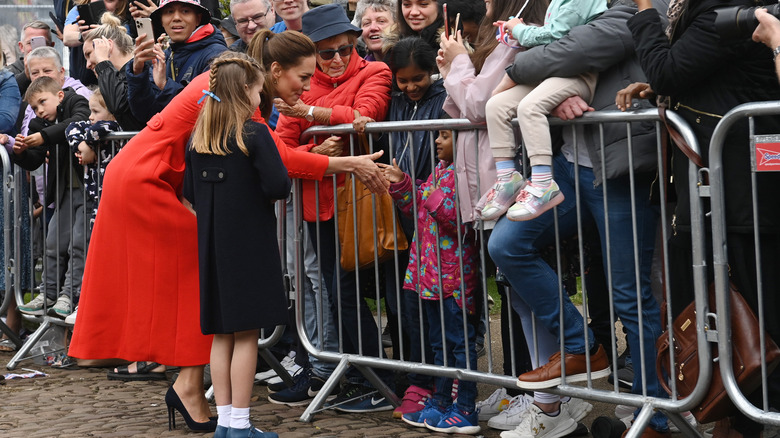 Princess Kate with a child