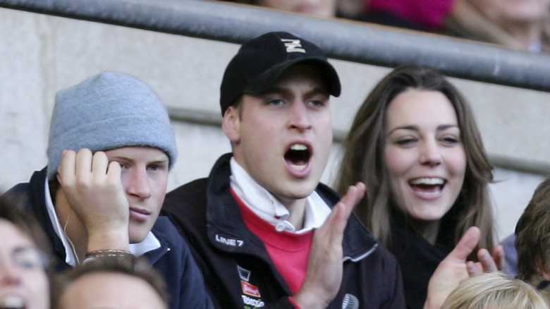 Prince William and Kate Middleton at a sporting event. 