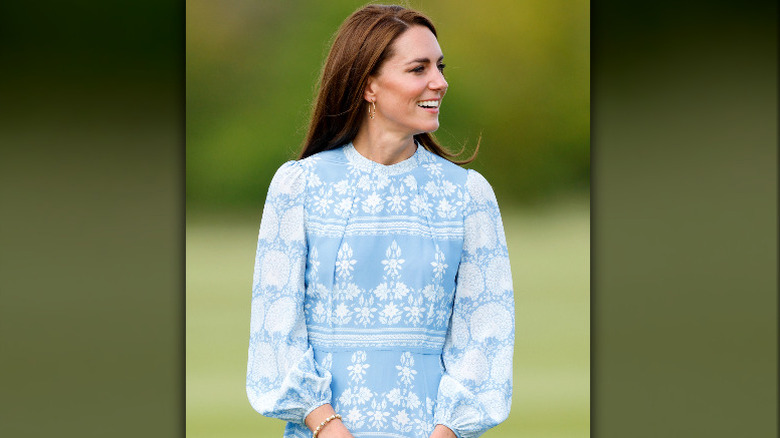 Kate Middleton smiling at Royal Charity Polo Cup