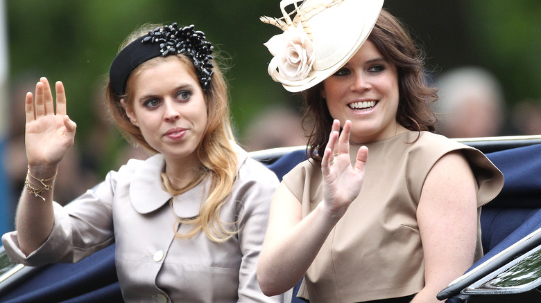 Princesses Beatrice and Eugenie waving