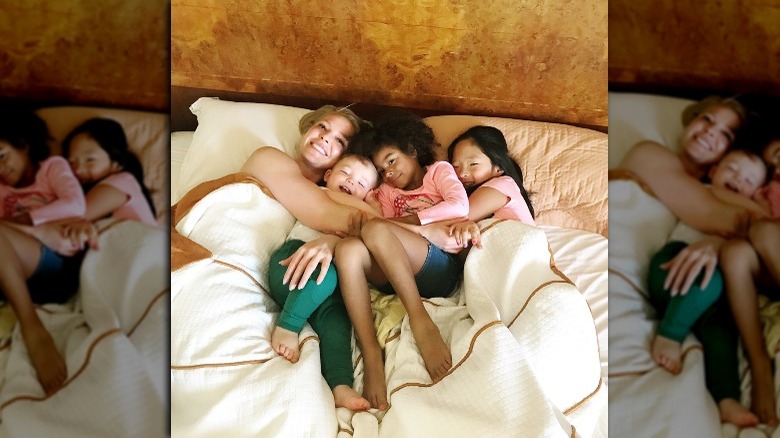 Katherine Heigl cuddling in bed with her three kids