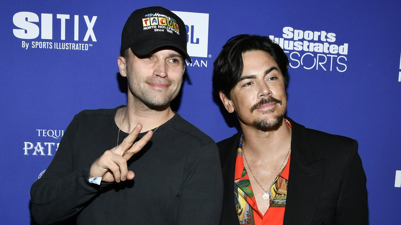 Tom Schwartz and Tom Sandoval posing at an event