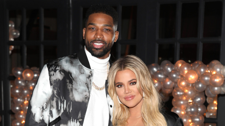 Khloe Kardashian and Tristan Thompson pose for a photo. 