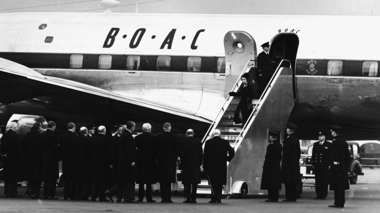 Queen Elizabeth returning from Kenya 