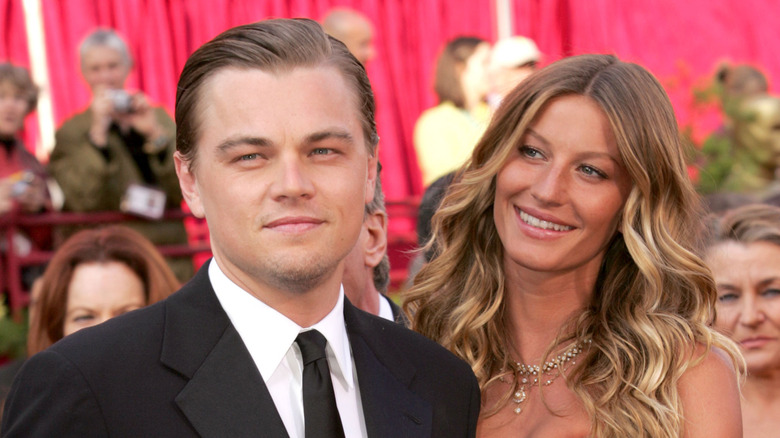 Gisele Bündchen and Leonardo DiCaprio posing