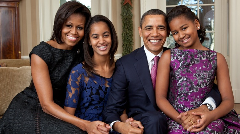 The Obama family smiling in portrait