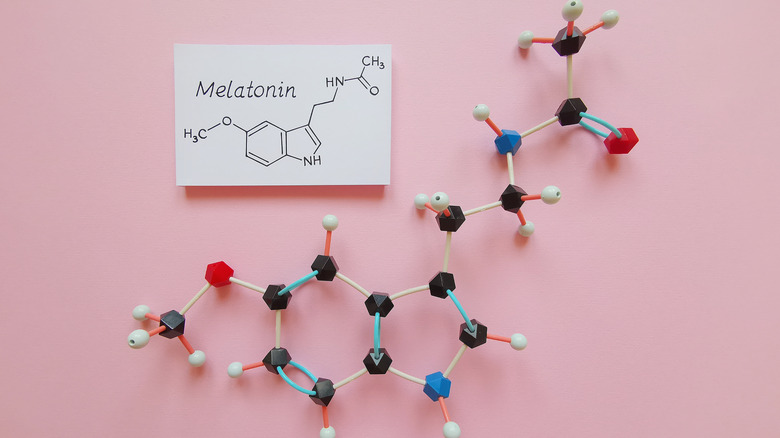 Card showing chemical composition of melatonin