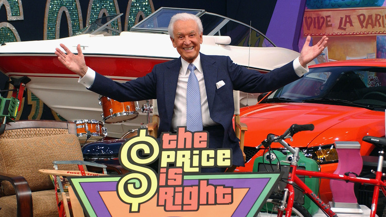 Former host Bob Barker poses with prizes