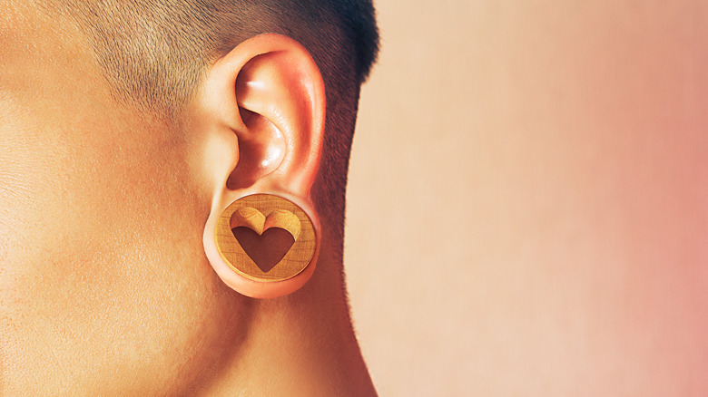 woman with ear gauges