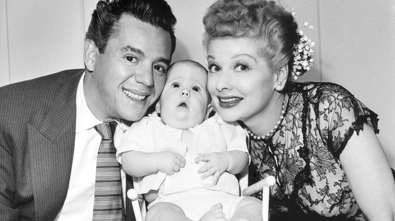 Lucille Ball and Desi Arnaz and newborn Desi Jr.