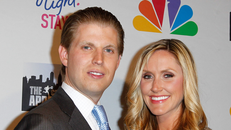 Eric and Lara Trump posing for a photo