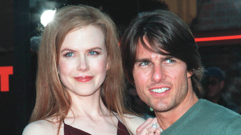 Nicole Kidman and Tom Cruise posing at premiere