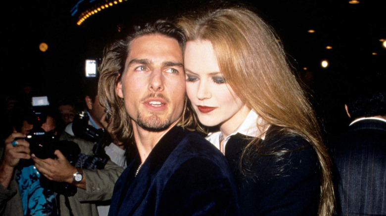 Nicole Kidman hugging Tom Cruise from behind