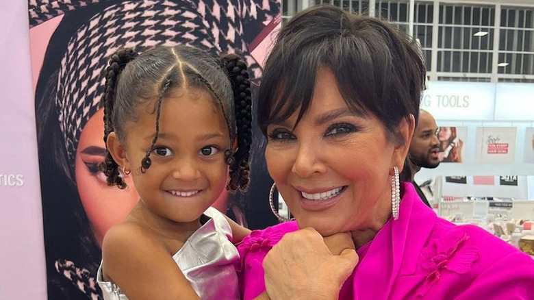 Kris Jenner holding her granddaughter, Stormi Webster