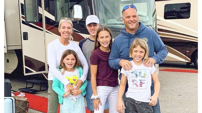 Sarah and Bryan Baeumler with their four kids