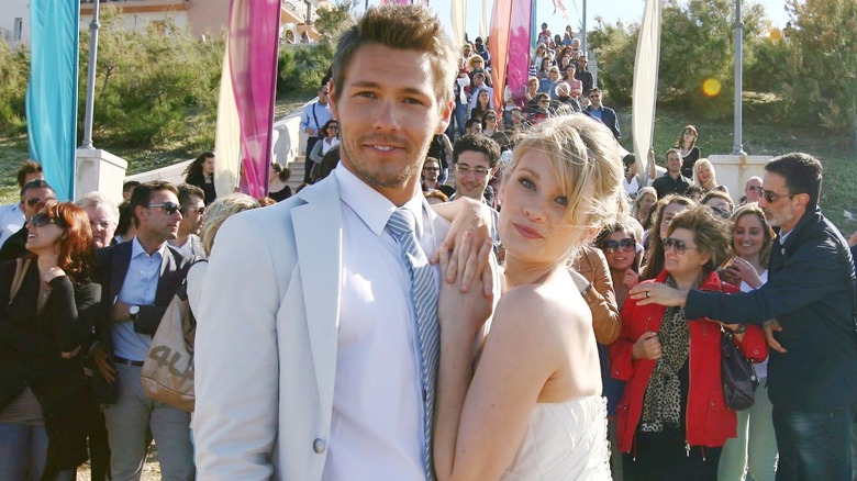 Scott Clifton and Kimberly Matula posing