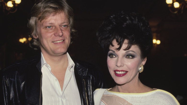 Peter Holm and Joan Collins posing