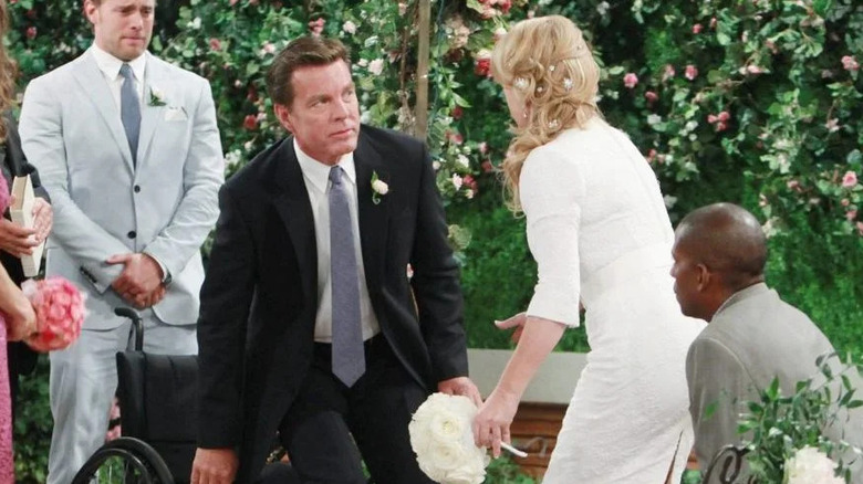 Jack standing up from his wheelchair at the altar