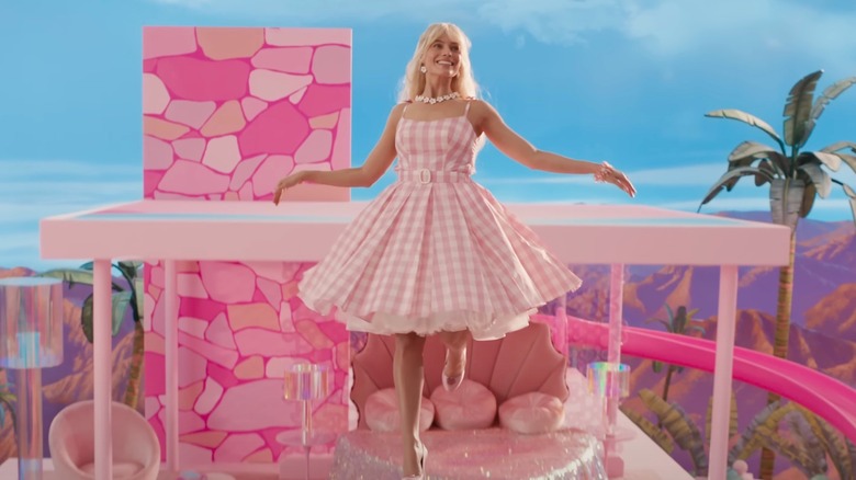 Margot Robbie floating as Barbie