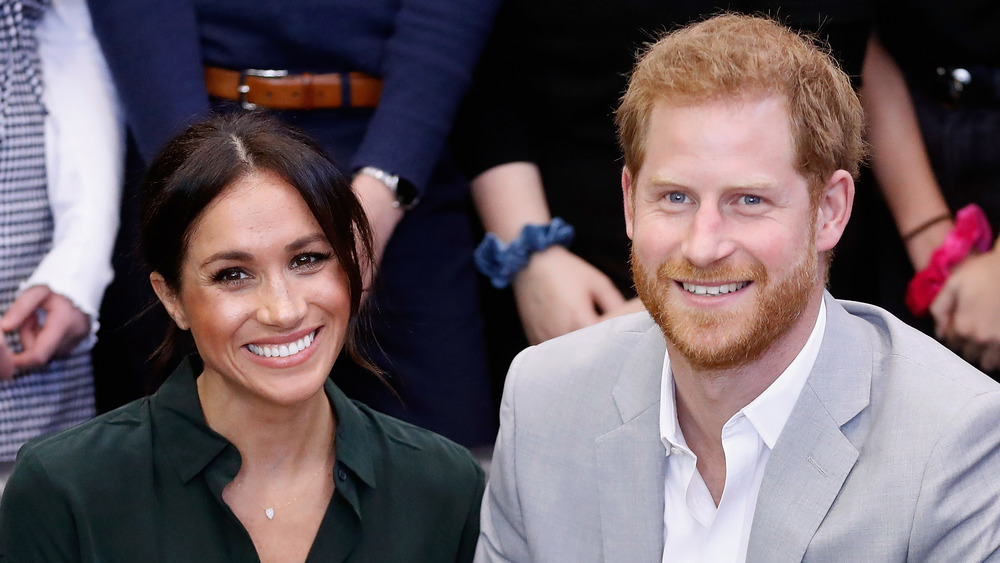 Meghan and Harry smiling