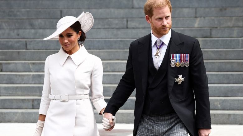 Meghan Markle and Prince Harry looking disappointed at the Platinum Jubilee