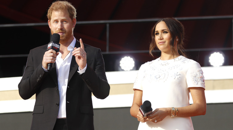 Meghan Markle and Prince Harry speak at an event