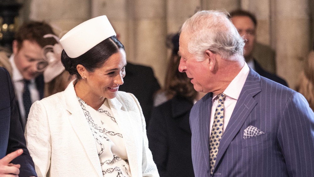 Prince Charles and Meghan Markle chatting