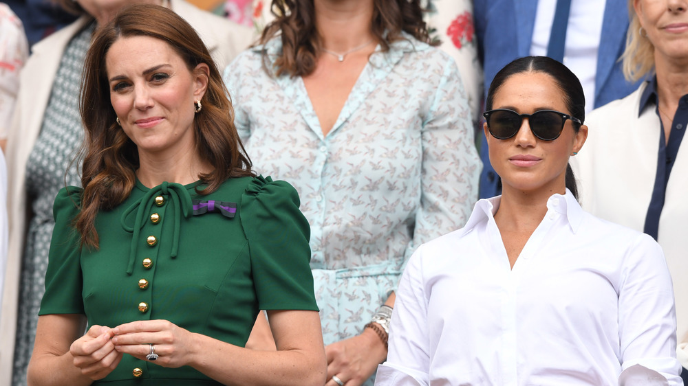 Kate Middleton and Meghan Markle at an event