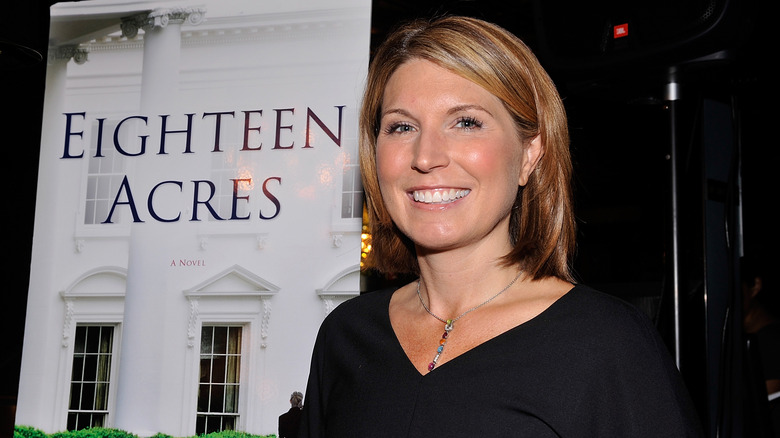 Nicolle Wallace next to "Eighteen Acres" poster