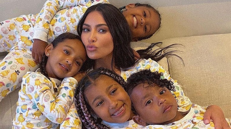 Kim Kardashian and her children posing for a picture on Instagram