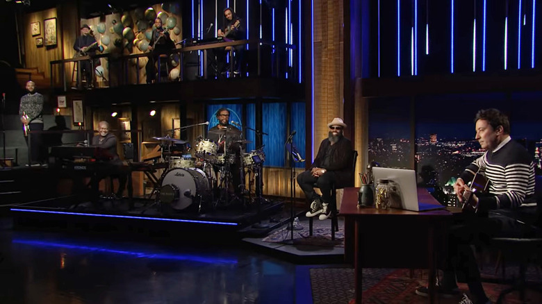 Jimmy fallon and The Roots performing on a late night show