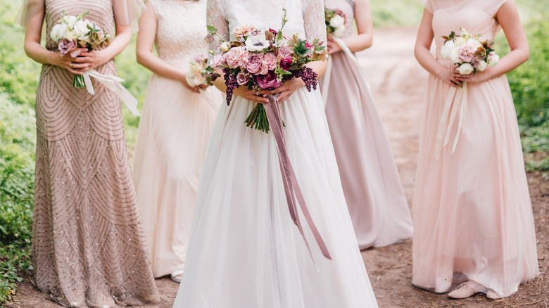 Bridesmaids maid of honor with bride