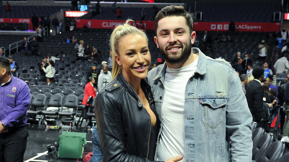 Baker Mayfield and Emily Wilkinson posing in a photo