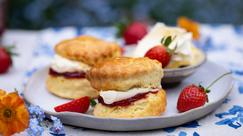Scones with cream and strawberries
