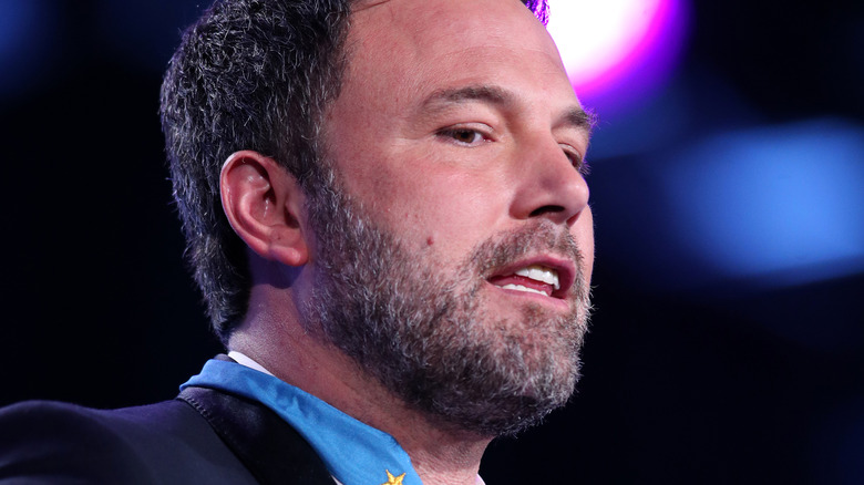 Ben Affleck close up medal around his neck