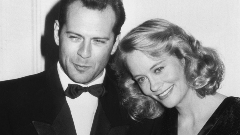 Bruce Willis and Cybil Shepard smiling