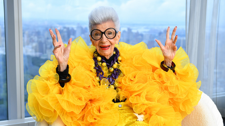 Iris Apfel wearing yellow