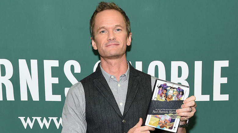 Neil Patrick Harris poses with the second "The Magic Misfits" book