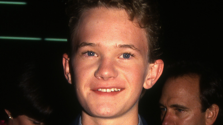 A teenage Neil Patrick Harris smirking