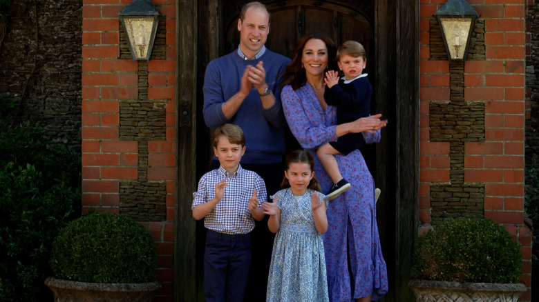 Prince William, Kate Middleton, Prince George, Princess Charlotte, and Prince Louis clapping