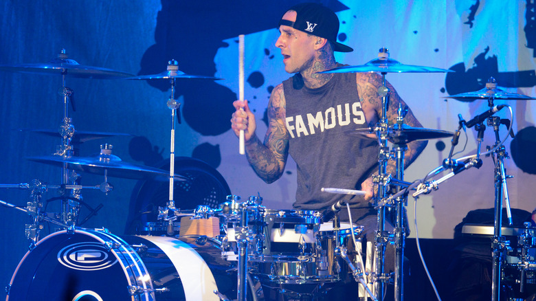 Travis Barker performing in "Famous" t-shirt