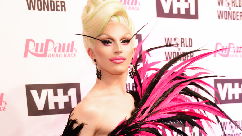 Aquaria poses on red carpet