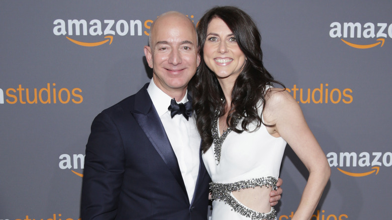 Mackenzie Scott and Jeff Bezos posing for photos