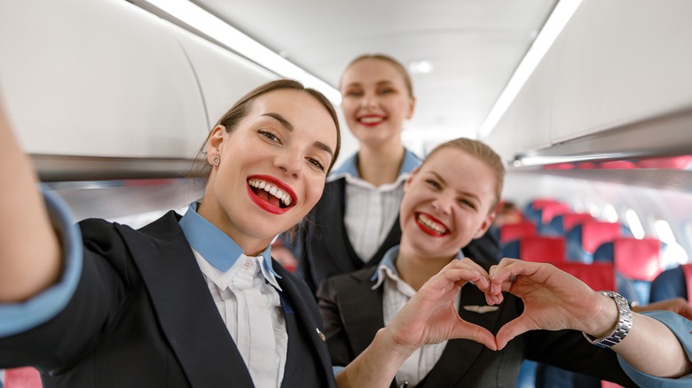 flight attendants taking a selfie