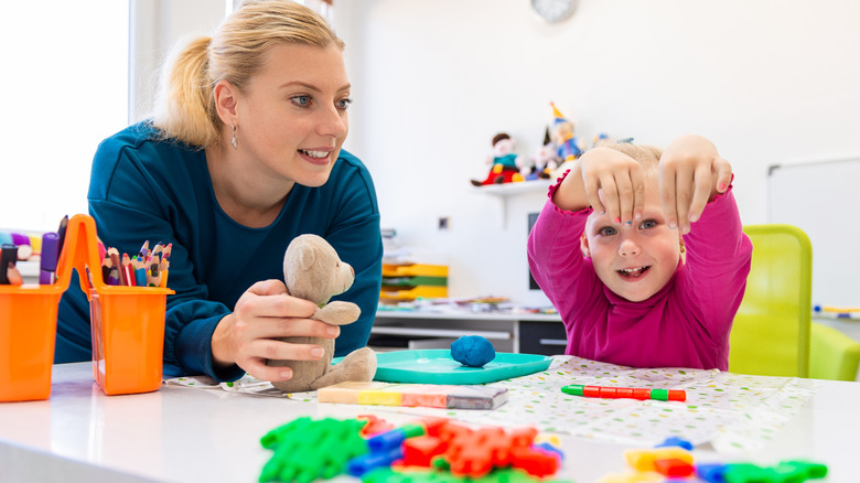 child working with an occupational therapist